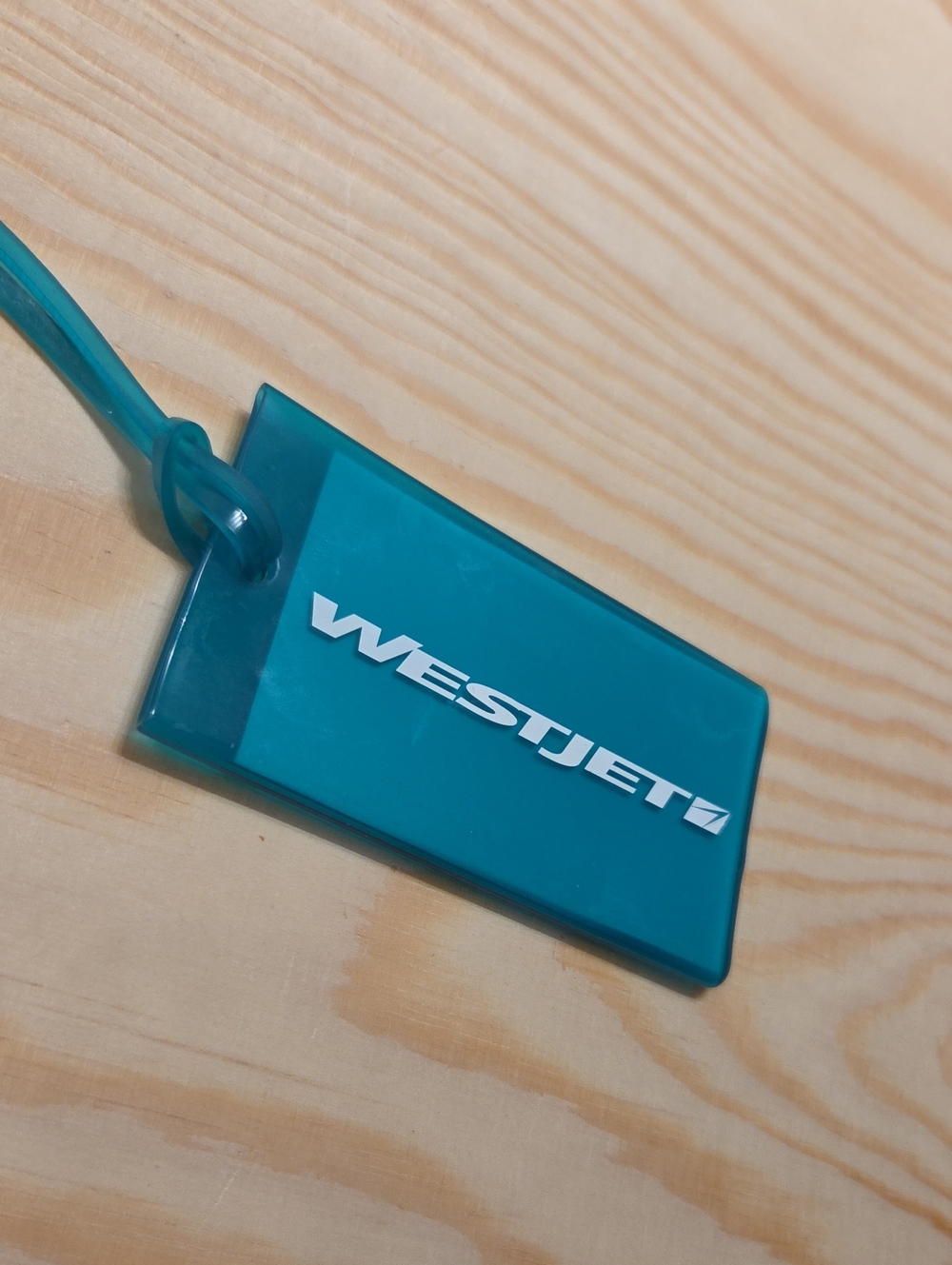 Vintage WestJet Teal Luggage Tag